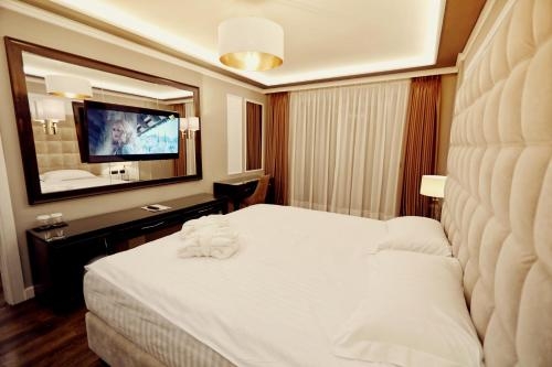 Imagen de la habitación del Hotel Premium Beach. Foto 9