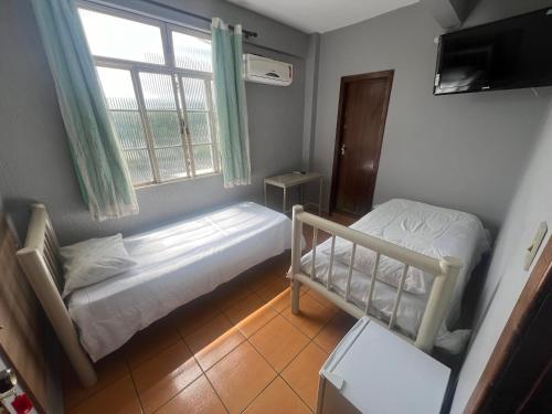 Imagen de la habitación del Hotel Premium Center. Foto 16