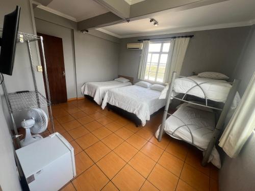 Imagen de la habitación del Hotel Premium Center. Foto 19