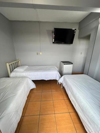 Imagen de la habitación del Hotel Premium Center. Foto 20