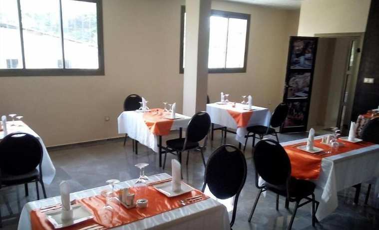 Imagen del bar/restaurante del Hotel Premium, Douala. Foto 2