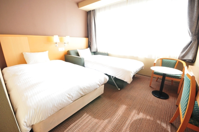 Imagen de la habitación del Hotel Premium Green Hills. Foto 8