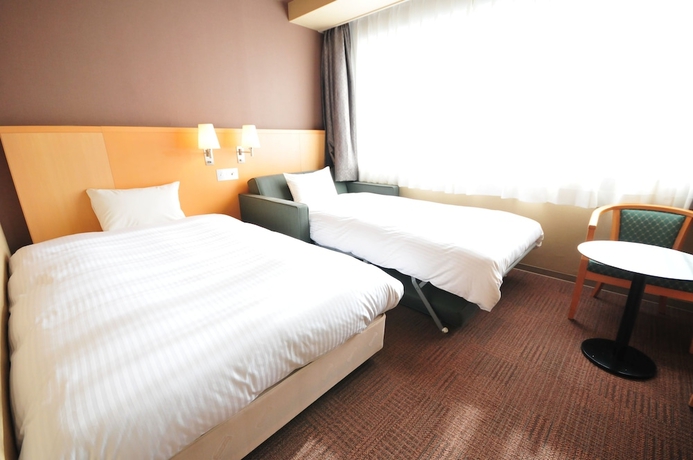 Imagen de la habitación del Hotel Premium Green Hills. Foto 9