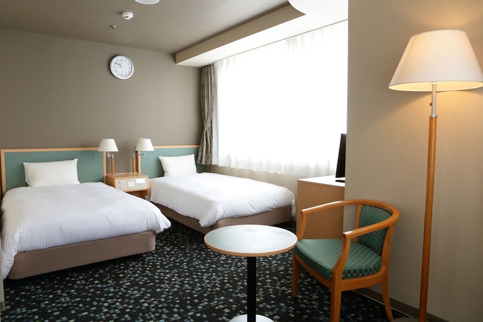 Imagen de la habitación del Hotel Premium Green Hills. Foto 10