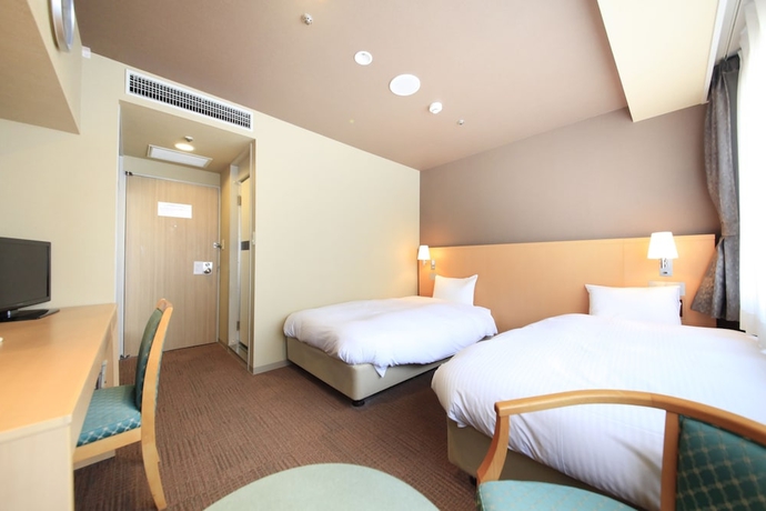 Imagen de la habitación del Hotel Premium Green Hills. Foto 11