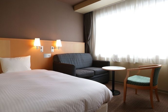 Imagen de la habitación del Hotel Premium Green Hills. Foto 14