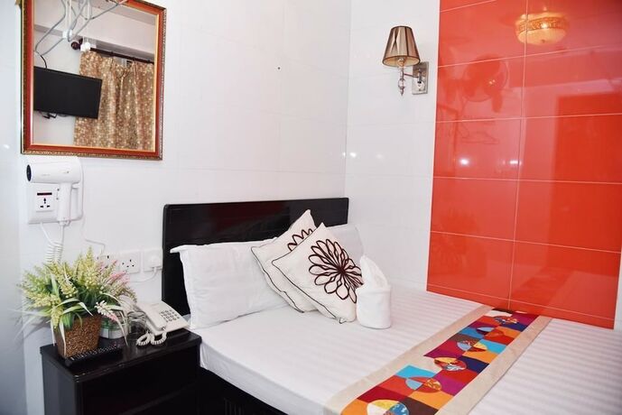 Imagen de la habitación del Hotel Premium Lounge, Kowloon. Foto 12