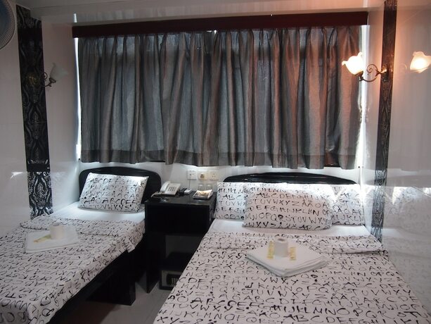 Imagen de la habitación del Hotel Premium Lounge, Kowloon. Foto 14