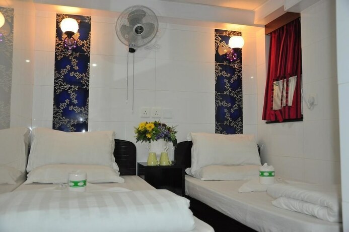 Imagen de la habitación del Hotel Premium Lounge, Kowloon. Foto 18