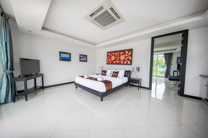 Imagen de la habitación del Hotel Premium Pool Villas Pattaya. Foto 11