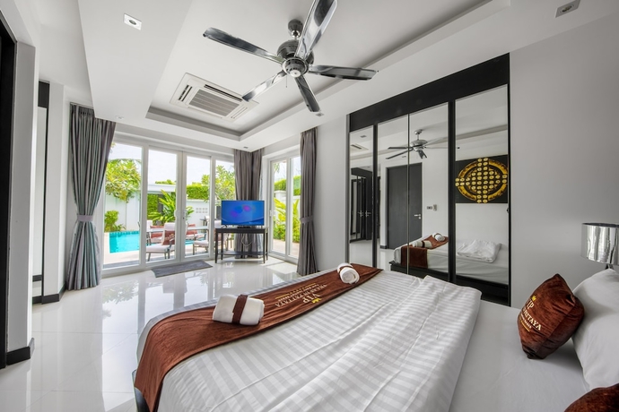 Imagen de la habitación del Hotel Premium Pool Villas Pattaya. Foto 14