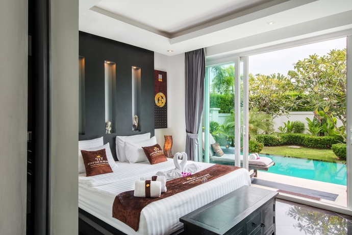 Imagen de la habitación del Hotel Premium Pool Villas Pattaya. Foto 15