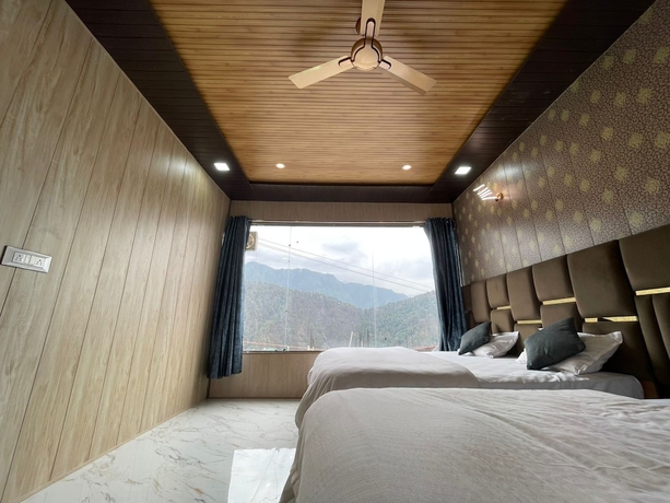 Imagen de la habitación del Hotel Premji And Restaurant. Foto 5