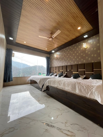 Imagen de la habitación del Hotel Premji And Restaurant. Foto 6