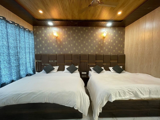 Imagen de la habitación del Hotel Premji And Restaurant. Foto 10