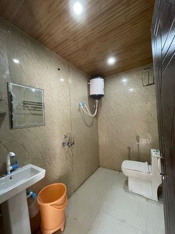 Imagen de la habitación del Hotel Premji And Restaurant. Foto 11