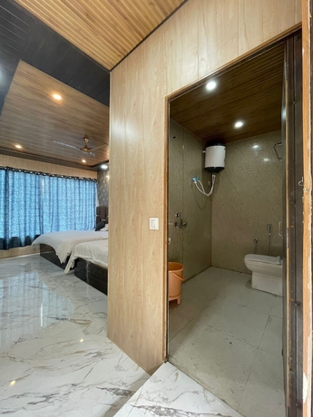 Imagen de la habitación del Hotel Premji And Restaurant. Foto 12