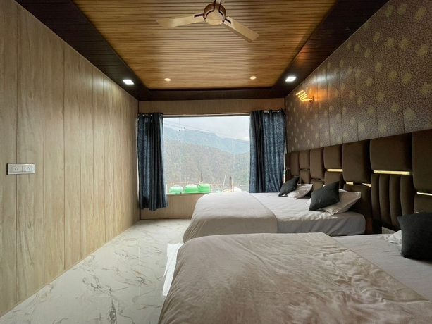 Imagen de la habitación del Hotel Premji And Restaurant. Foto 14