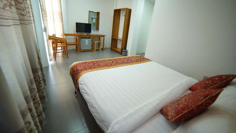 Imagen de la habitación del Hotel Present. Foto 10