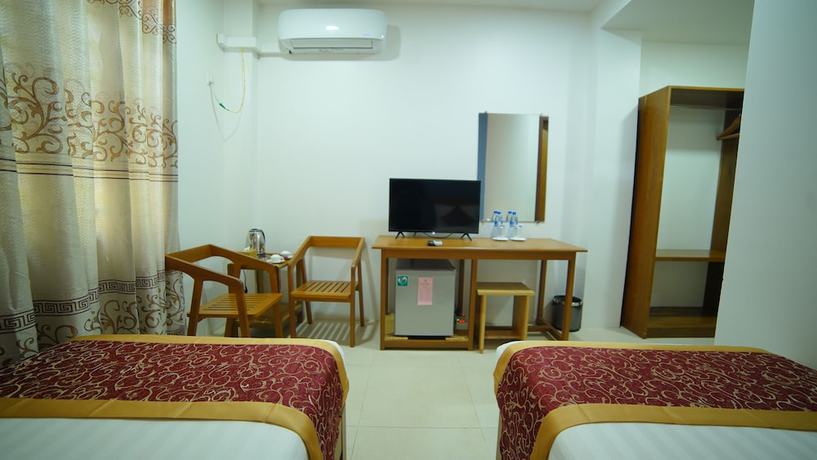 Imagen de la habitación del Hotel Present. Foto 12