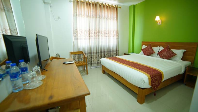 Imagen de la habitación del Hotel Present. Foto 14