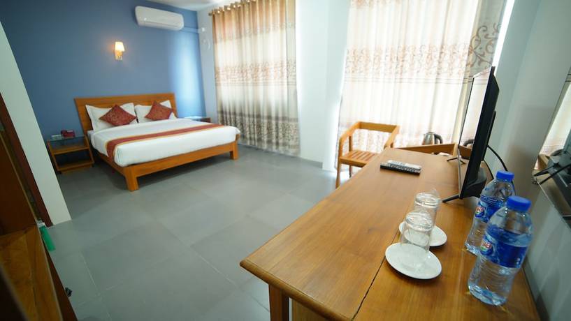 Imagen de la habitación del Hotel Present. Foto 16