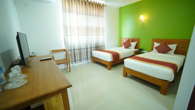 Imagen de la habitación del Hotel Present. Foto 18