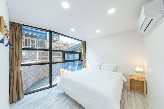 Imagen de la habitación del Hotel Present Poolvilla. Foto 14