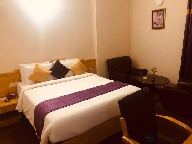 Imagen de la habitación del Hotel Presidency. Foto 17