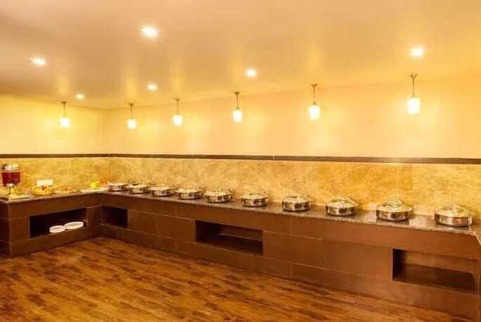 Imagen del bar/restaurante del Hotel Presidency Landmark. Foto 2