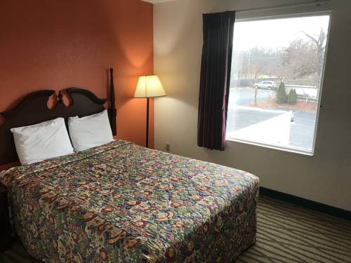 Imagen de la habitación del Hotel President Inn & Suites. Foto 2