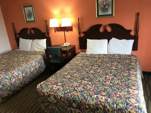 Imagen de la habitación del Hotel President Inn & Suites. Foto 4