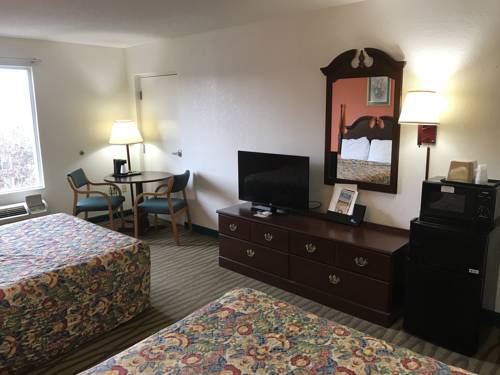 Imagen de la habitación del Hotel President Inn & Suites. Foto 6