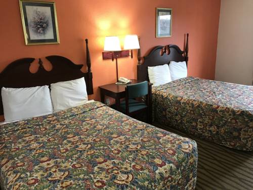 Imagen de la habitación del Hotel President Inn & Suites. Foto 7