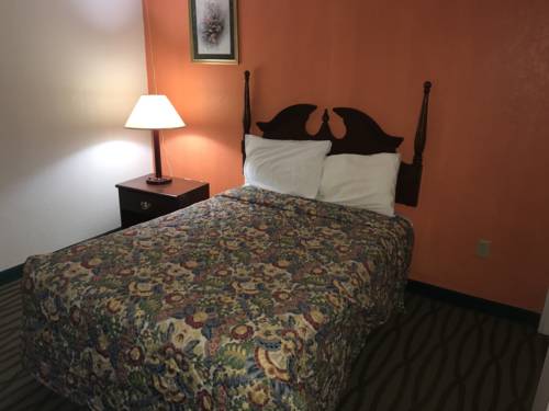 Imagen de la habitación del Hotel President Inn & Suites. Foto 15
