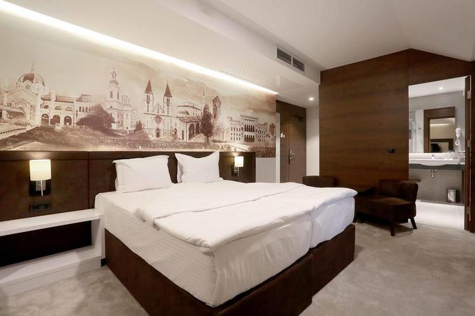 Imagen de la habitación del Hotel President Sarajevo. Foto 11