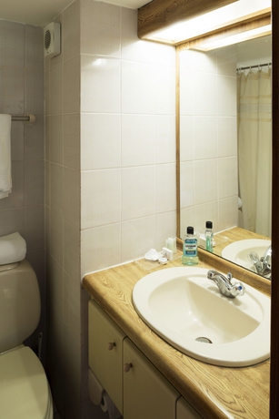 Imagen de la habitación del Hotel Presidente Edificio Santiago. Foto 11