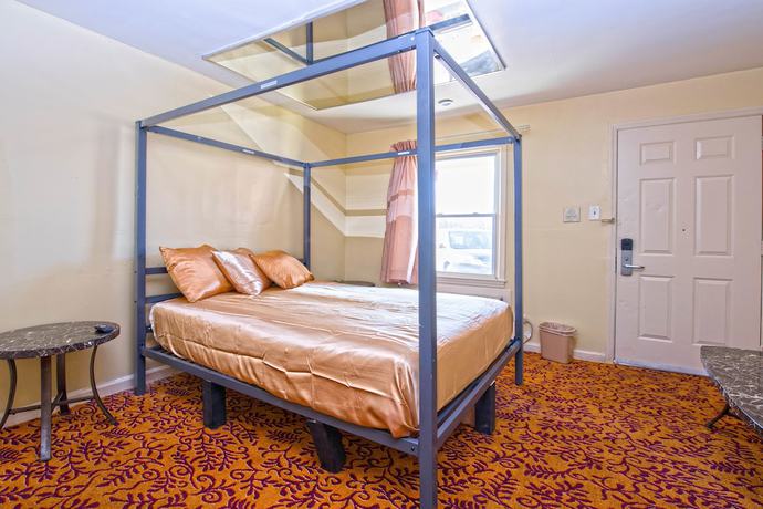 Imagen de la habitación del Hotel Presidential Inn and Suites. Foto 2