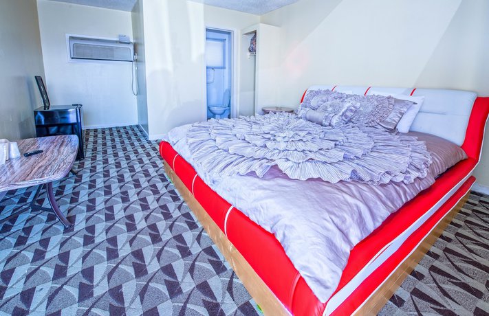 Imagen de la habitación del Hotel Presidential Inn and Suites. Foto 16