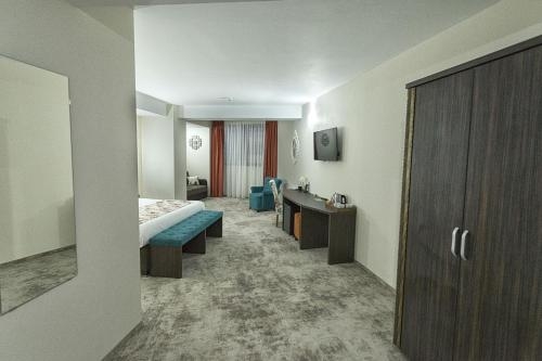 Imagen de la habitación del Hotel Prestige Boutique Craiova. Foto 9
