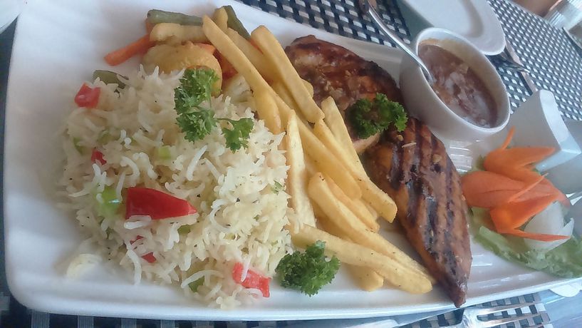 Imagen del bar/restaurante del Hotel Prestige, Mapusa. Foto 6