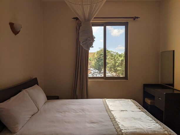 Imagen de la habitación del Hotel Prestige Suites, Kampala. Foto 16