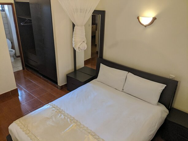 Imagen de la habitación del Hotel Prestige Suites, Kampala. Foto 17