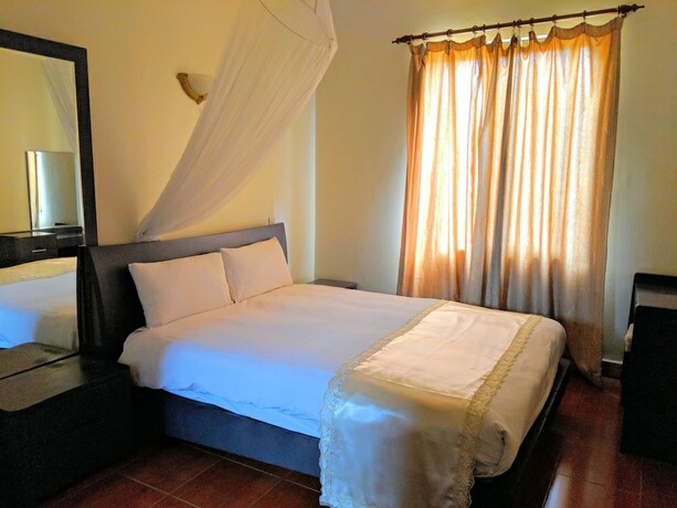 Imagen de la habitación del Hotel Prestige Suites, Kampala. Foto 18