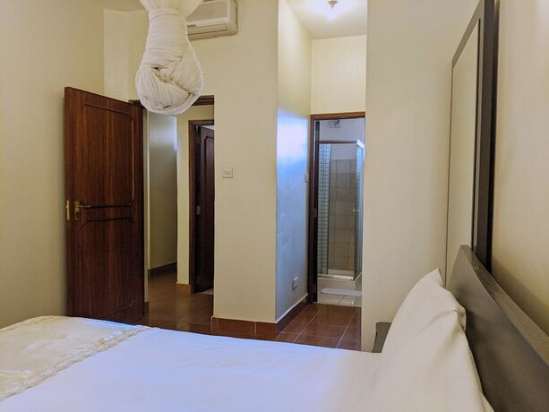 Imagen de la habitación del Hotel Prestige Suites, Kampala. Foto 19