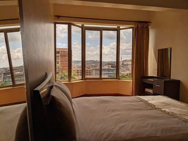 Imagen de la habitación del Hotel Prestige Suites, Kampala. Foto 20