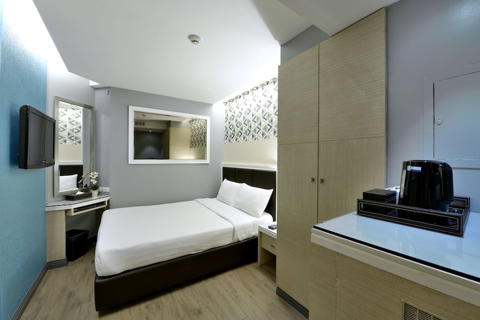 Imagen de la habitación del Hotel Prestige Suites Nana. Foto 12