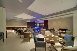 Imagen del bar/restaurante del Hotel Pride Bangalore. Foto 2