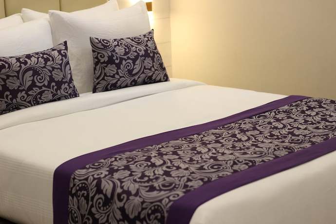 Imagen de la habitación del Hotel Pride Biznotel Canopus Digha. Foto 4