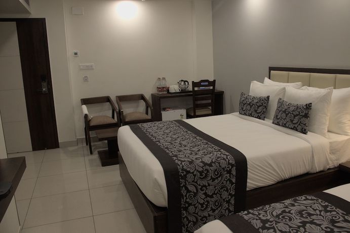 Imagen de la habitación del Hotel Pride Biznotel Canopus Digha. Foto 5